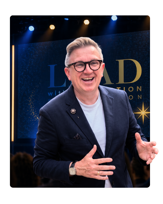 Professional keynote speaker presenting on stage for leadership, imagination, and transformational speaking events